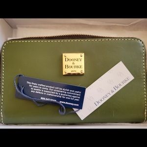 Luxurious Dooney and Bourke Vachetta Leather Zip Around Wallet/Wristlet